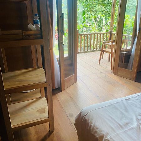 Uma D'Nyuh Homestay Сингараджа Экстерьер фото