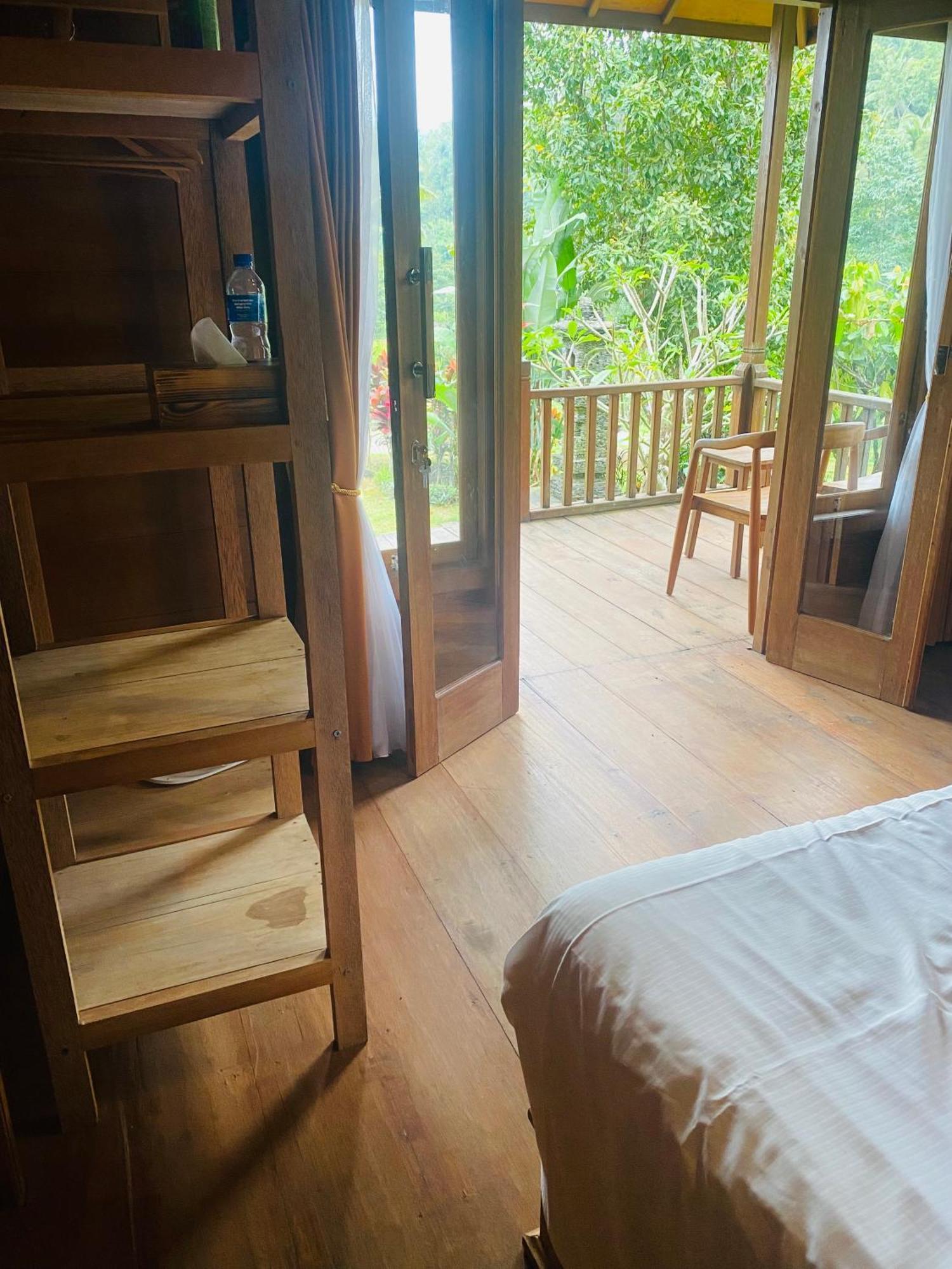 Uma D'Nyuh Homestay Сингараджа Экстерьер фото