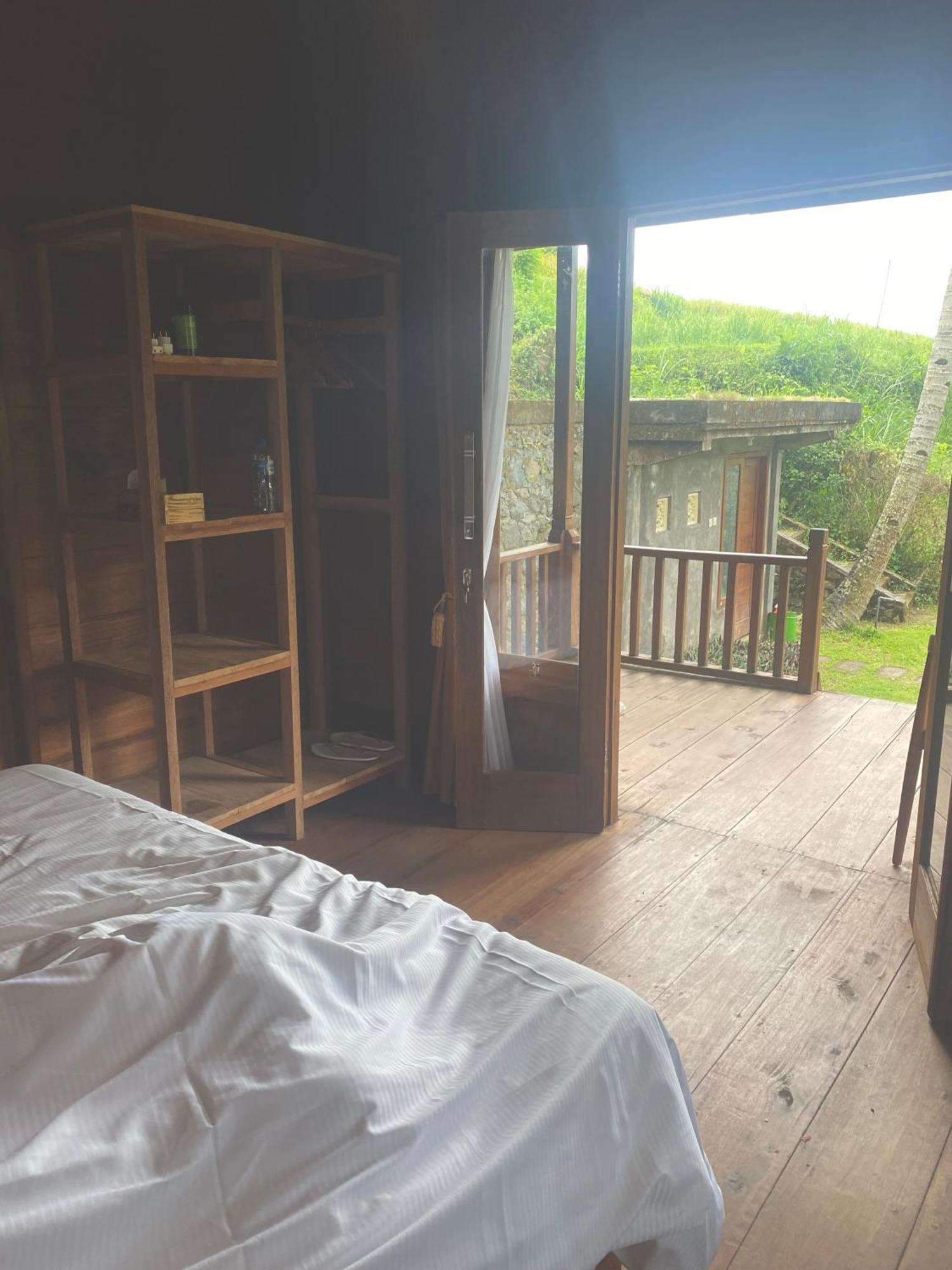 Uma D'Nyuh Homestay Сингараджа Экстерьер фото